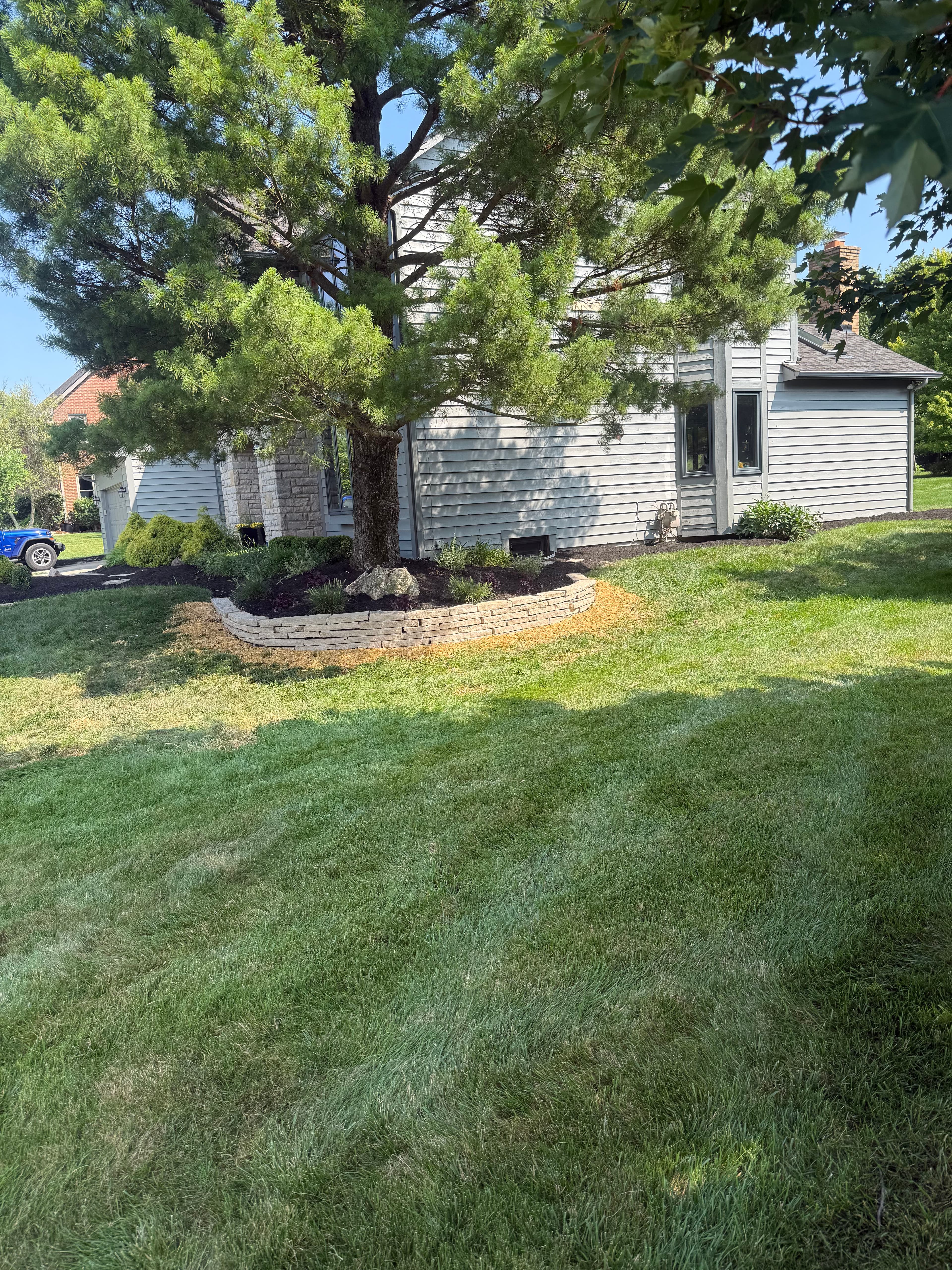Project Natural Stone Retaining Wall and Full Property Landscape Install image