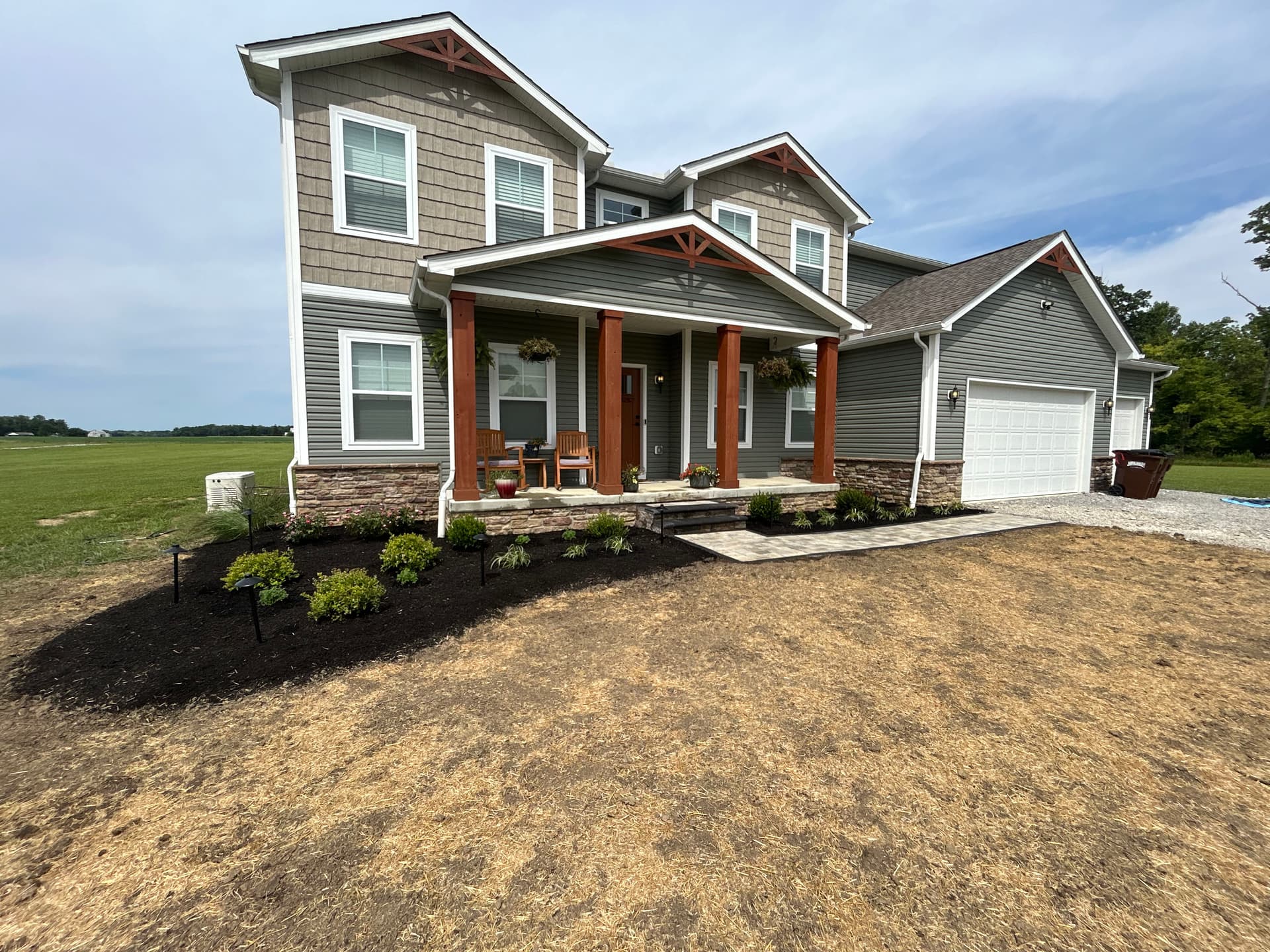 Gallery photos for Delaware Front Entry Gets Pavers, Plants, and Proper Drainage: Image #1