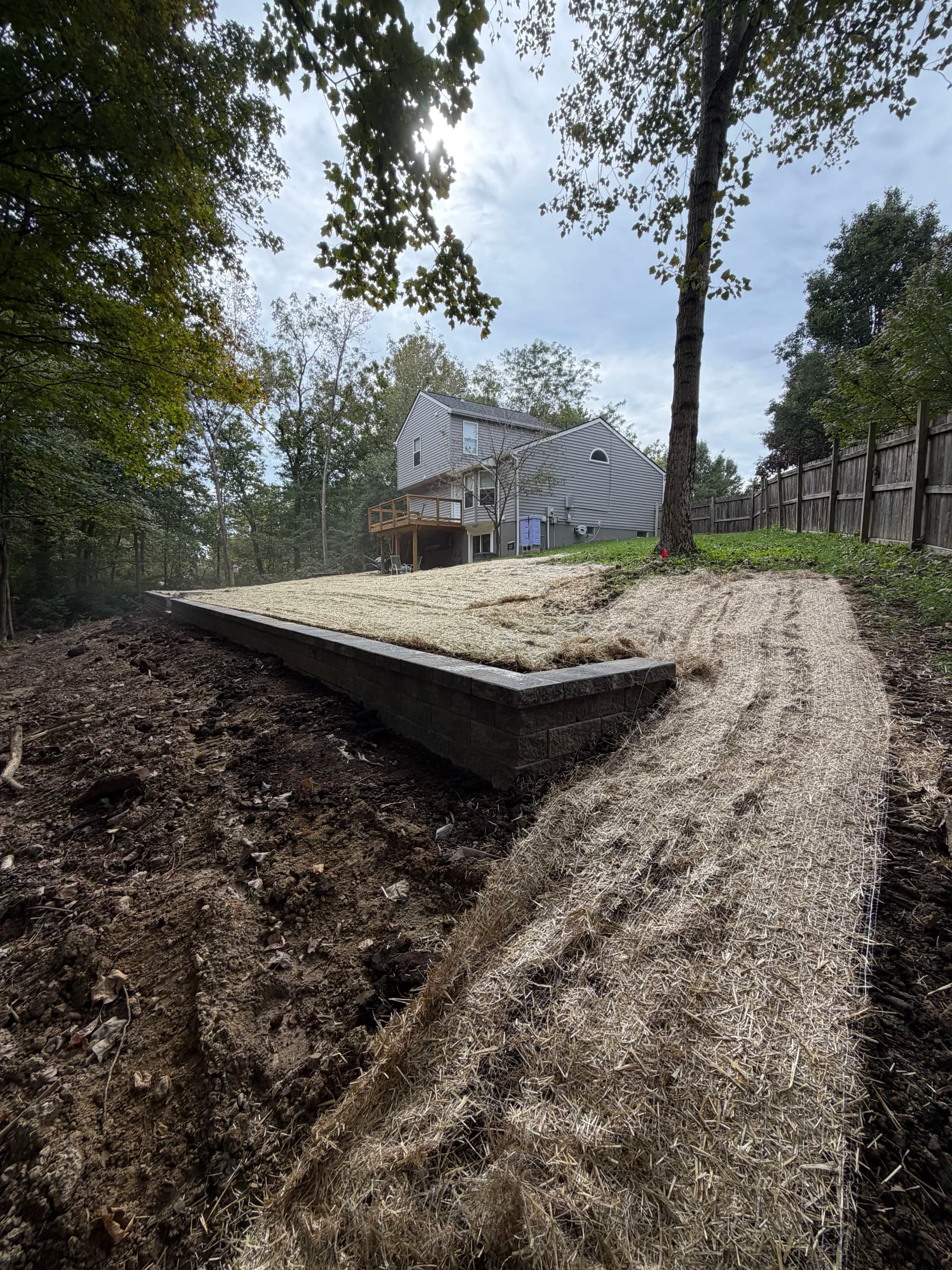 140-Foot Versa-Lok Retaining Wall with Yard Regrading