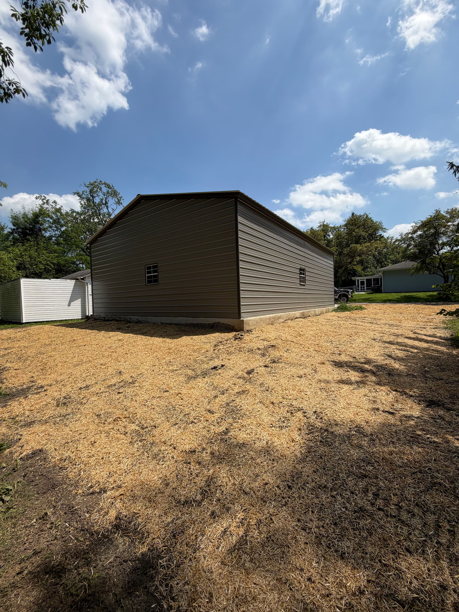 Gallery photos for Pole Barn Foundation Drainage Fixed With Regrading and Fill Dirt: Image #1
