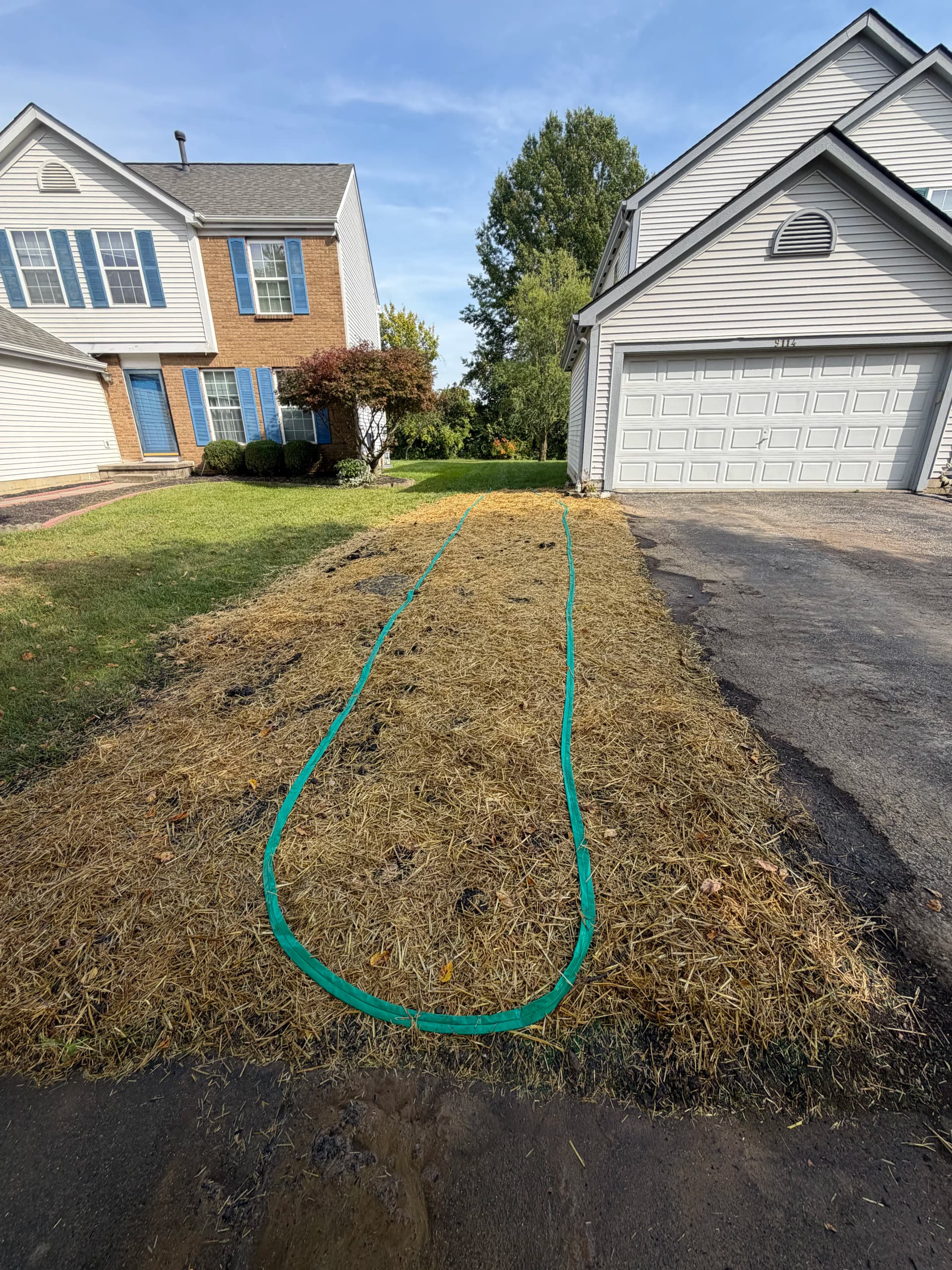 Buried Downspout Replacement and Full Lawn Regrade Fix