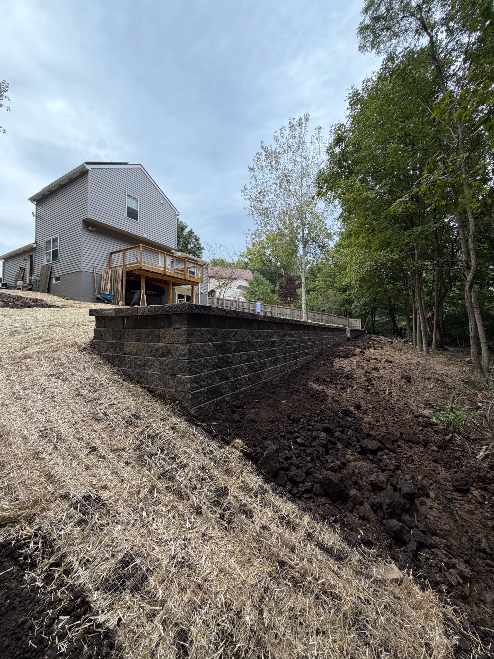 140-Foot Versa-Lok Retaining Wall with Yard Regrading