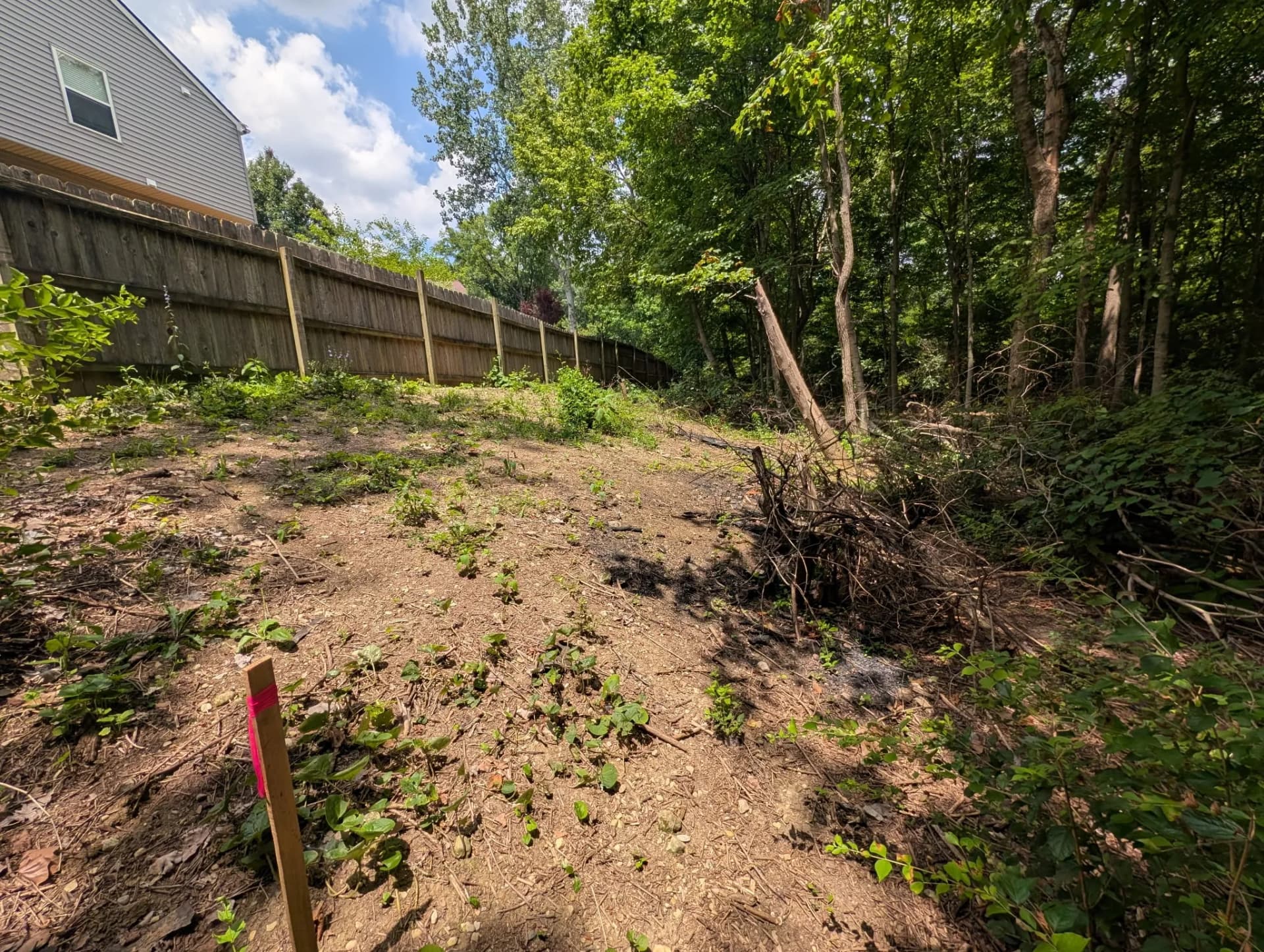 140-Foot Versa-Lok Retaining Wall with Yard Regrading